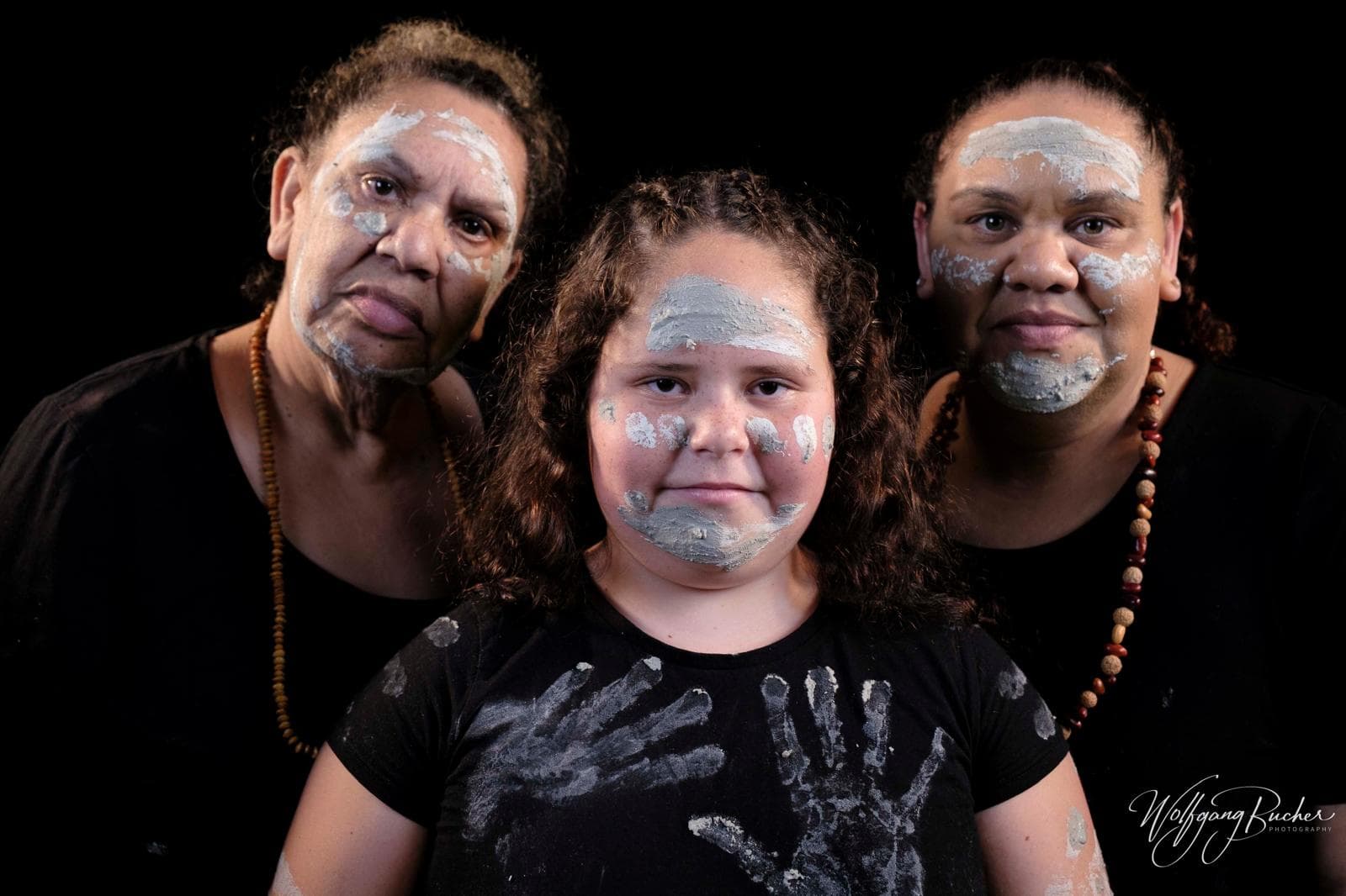 Giinagay community members sharing a cultural portrait together